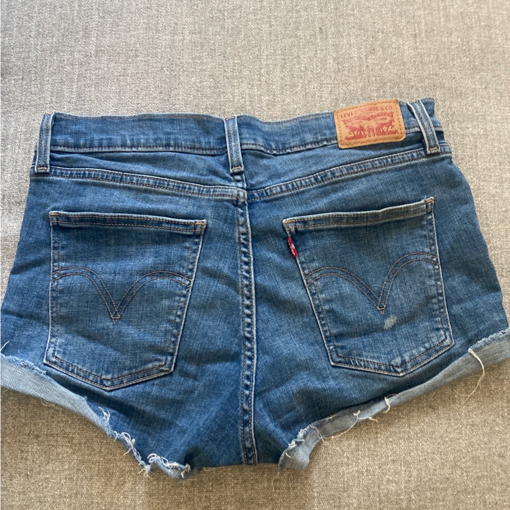 Lightly distressed Levi's denim cut off shorts